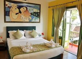 Honeymoon Villa bedroom decorated with a swan towel design