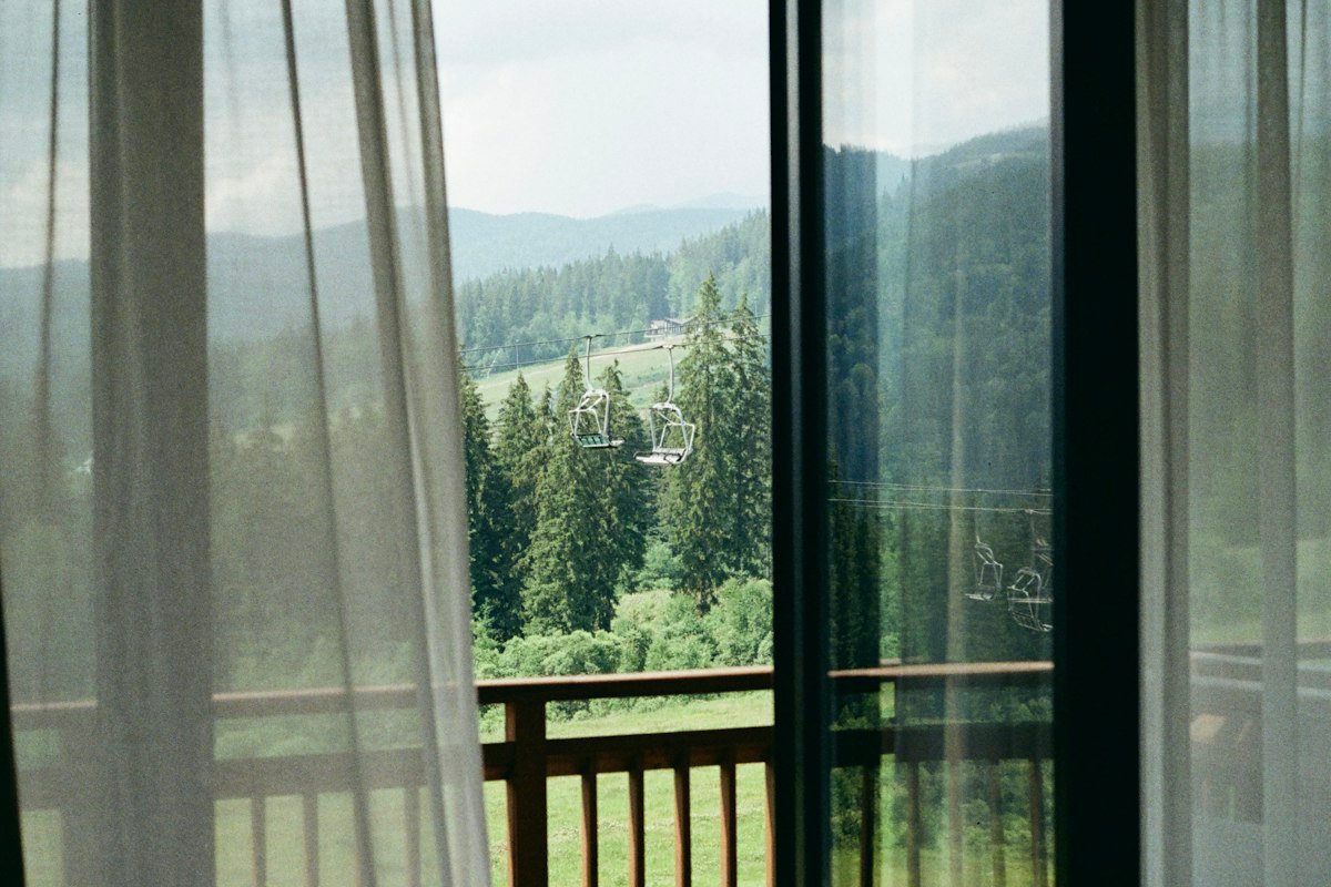 Balcony view over forested hills