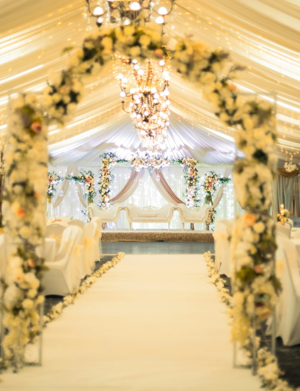 Reception hall with a floral archway